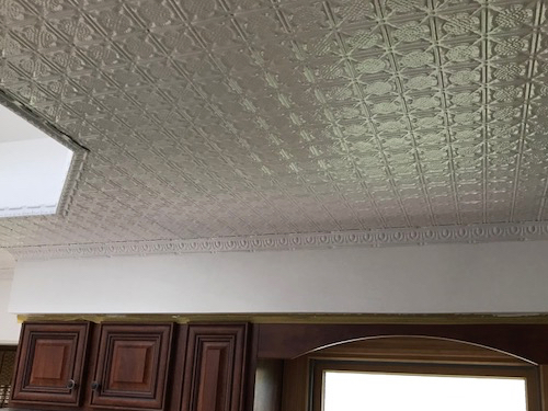 White tin ceiling tiles installation