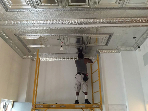 Installation of tin ceiling tiles